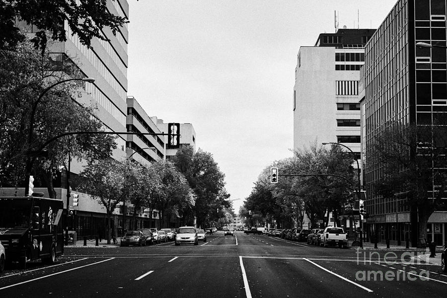 looking down 4th avenue at red light intersection in downtown saskatoon ...