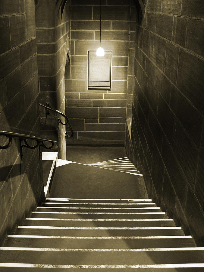 Architecture Photograph - Looking down steps in ancient building by Ken Biggs