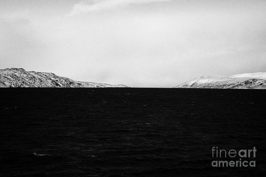 Winter Photograph - Looking Out From Kirkenes Finnmark Across The Barents Sea Between Norway Left And Russia Right Europ by Joe Fox