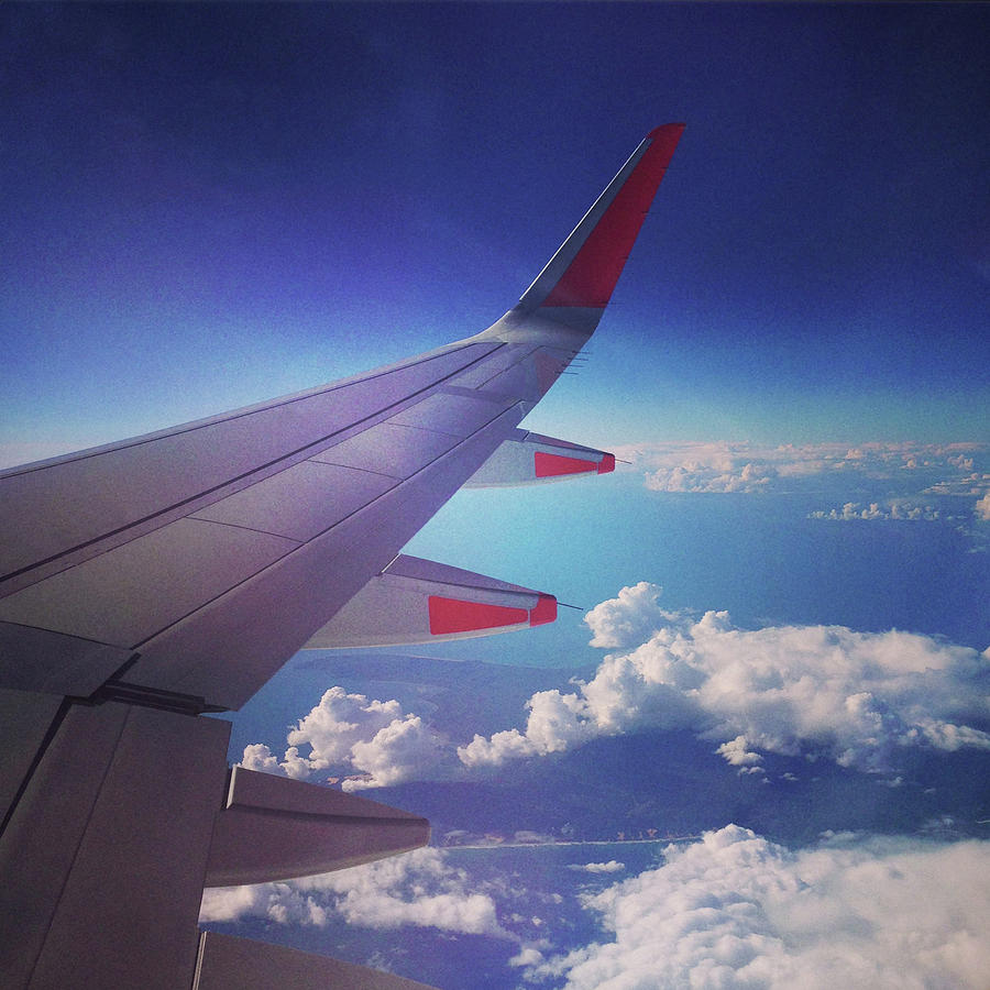 Looking Out Plane Window Over Wing Photograph by Jodie Griggs