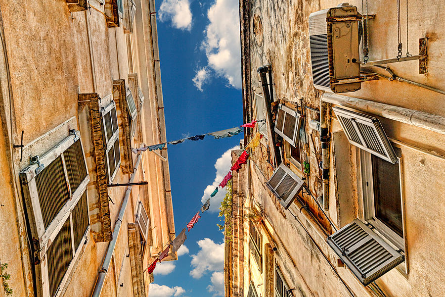 Looking up into the alleyways of Corfu - Greece Photograph by Constantinos Iliopoulos