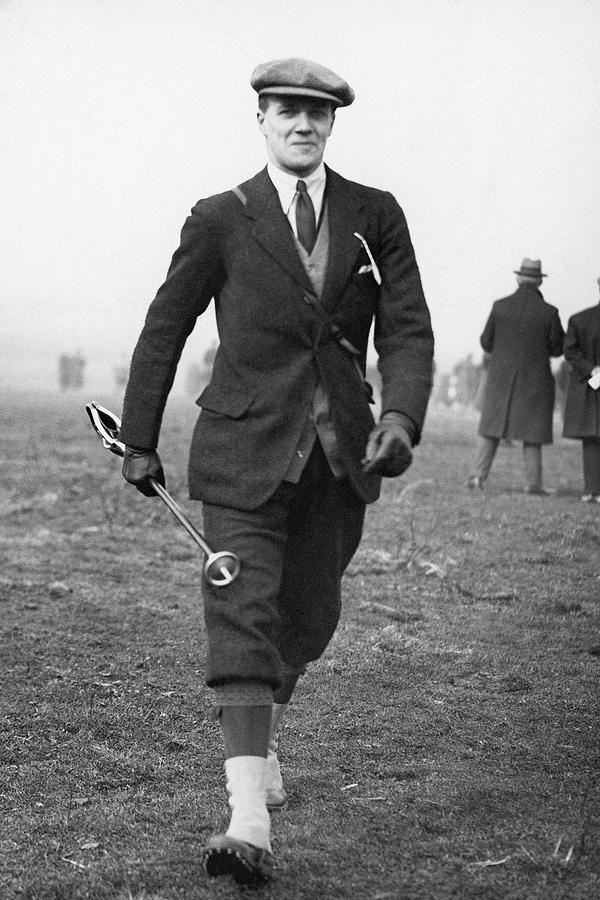 Lord Molyneux Walking Across A Field Photograph by  Acme