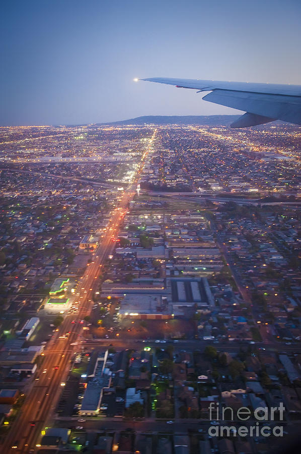 Los Angeles Aerial overview on approach to LAX at night  Photograph by David Zanzinger
