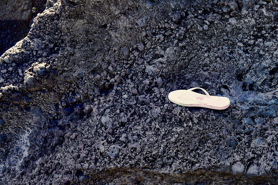 Lost Flip Flop on Lava Rock Photograph by Paulette B Wright