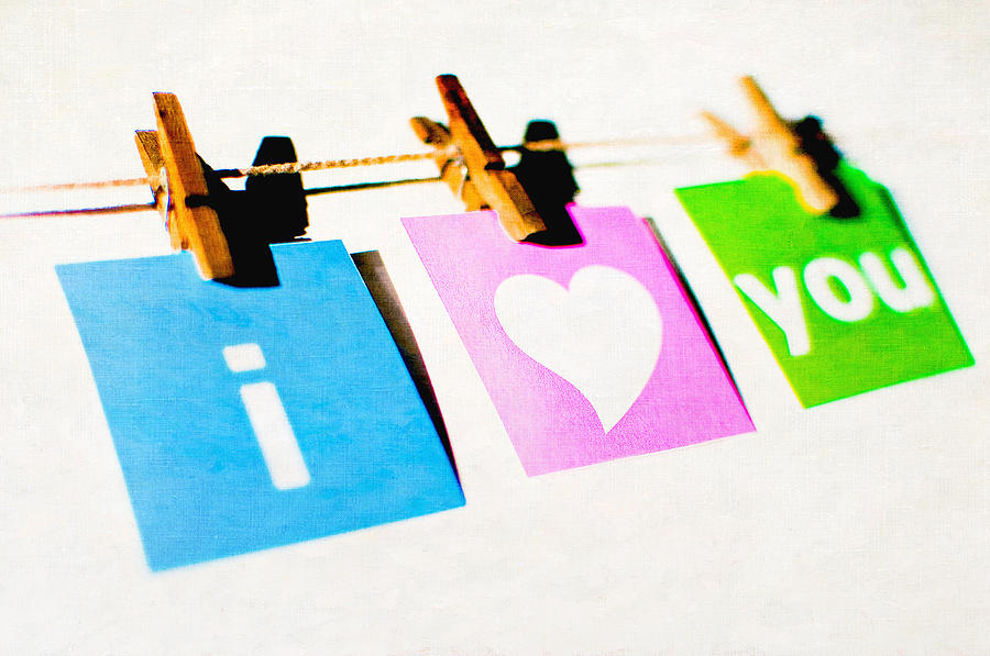 Love message hung on clothesline Photograph by Alexandre FP