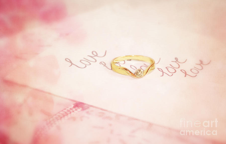 Ring Photograph - Love written with a golden ring by LHJB Photography