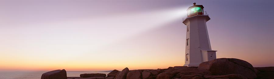 Architecture Photograph - Low Angle View Of A Lighthouse At Dusk by Panoramic Images