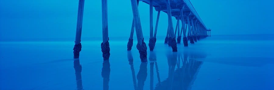 Nature Photograph - Low Angle View Of A Pier, Hermosa Beach by Panoramic Images
