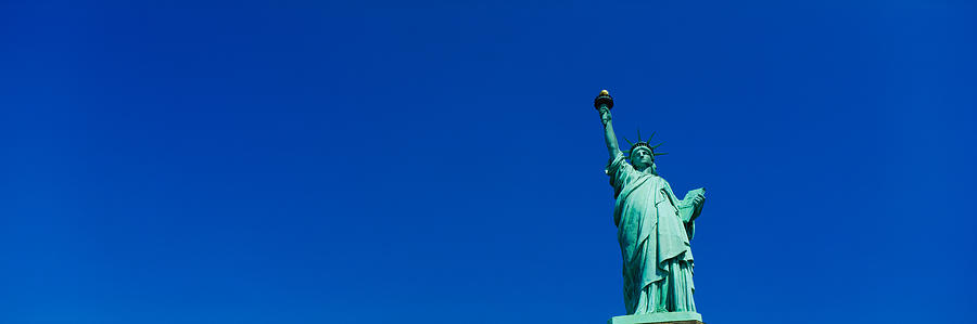 New York City Photograph - Low Angle View Of Statue Of Liberty by Panoramic Images