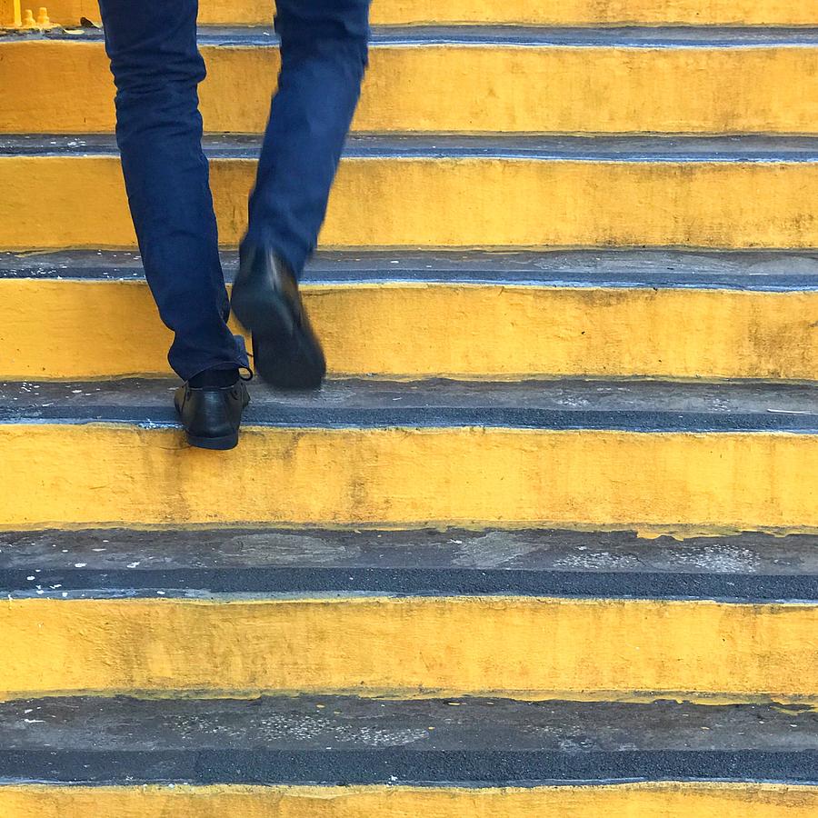 Low Section Of Man Walking On Steps Photograph by Evelyne Sieber / EyeEm