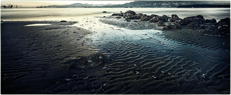 Low tide sunset beach with sand ripples and silky water Photograph by Peter V Quenter