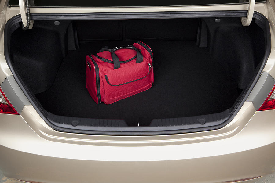 Luggage in Car Trunk Photograph by DonNichols