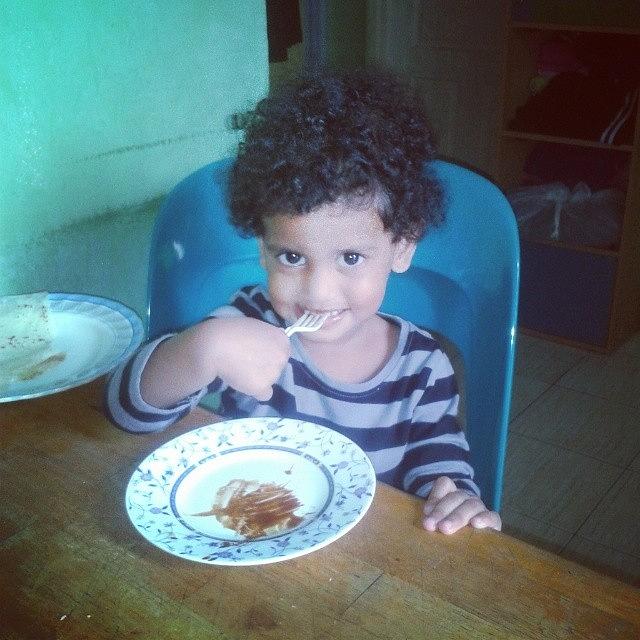 Lula Eating Rihaakuru With A Fork Photograph by Jumana Abbas