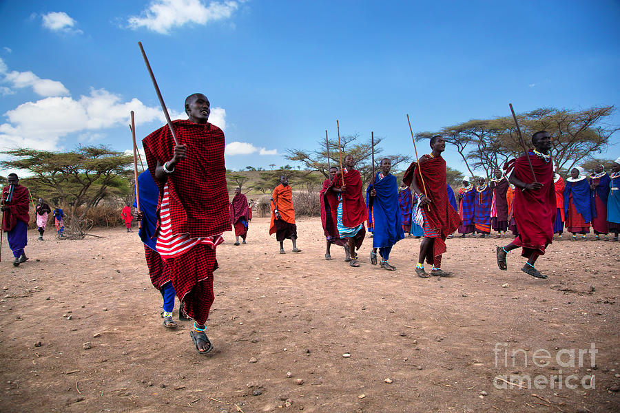 Nature Photograph - Maasai men in their ritual dance in their village in Tanzania by Michal Bednarek