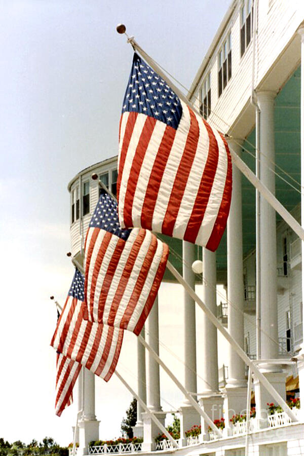 Mackinac Island Michigan - The Grand Hotel - American Flags Photograph by Kathy Fornal