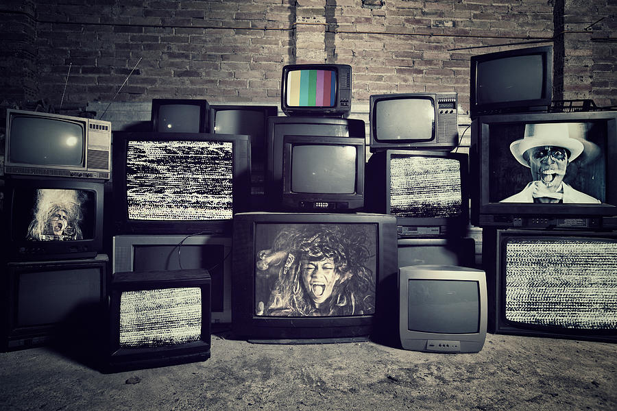 Mad about televisions Photograph by Xavierarnau