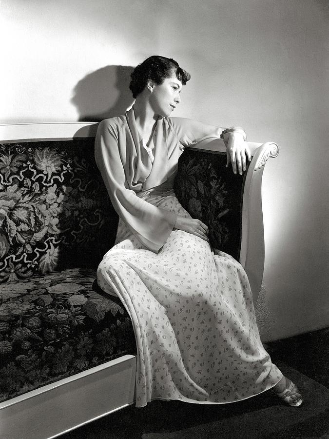 Madeleine De Bonnardel Sitting On A Couch Photograph by Horst P. Horst