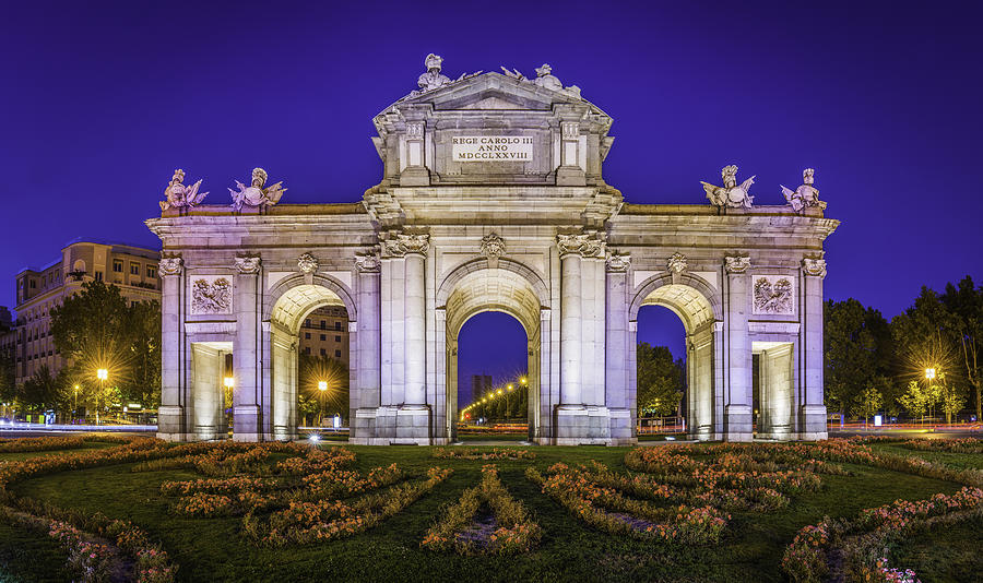 Madrid Puerta de Alcala iconic monumental gate illuminated dusk Spain Photograph by fotoVoyager