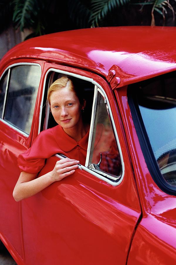 Maggie Rizer Sitting In A Vintage Car Photograph by Arthur Elgort