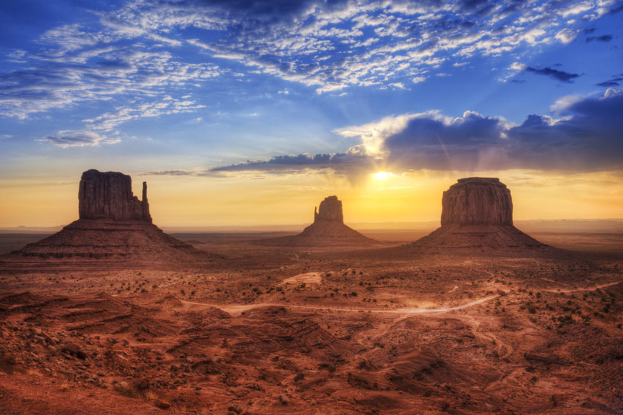 Magnificent landscape view of Monument Valley at sunset Photograph by FernandoAH