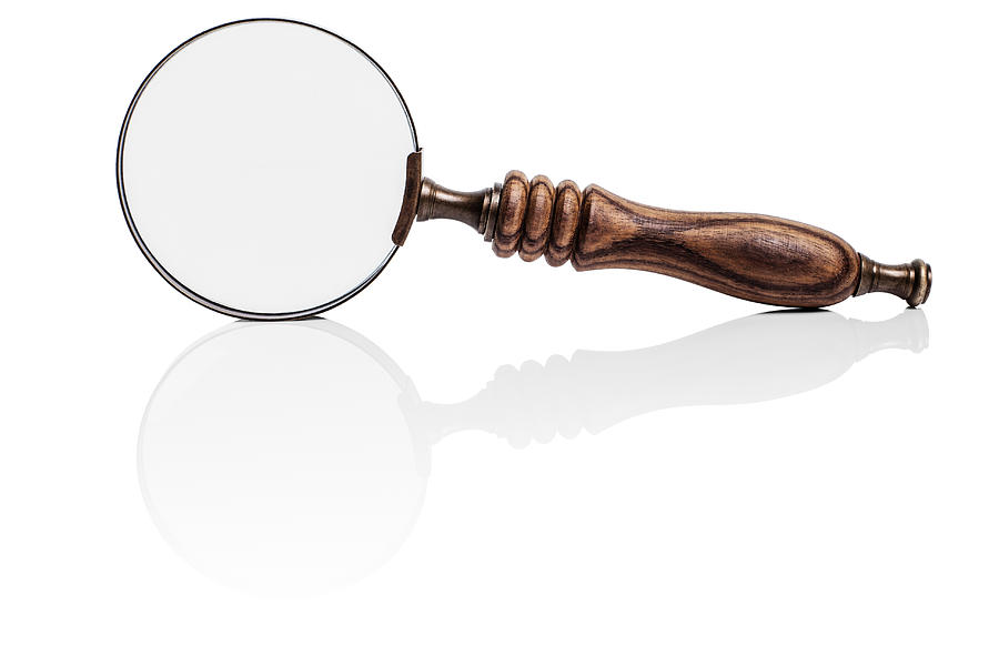 Magnifying glass / spyglass Photograph by Creative Crop