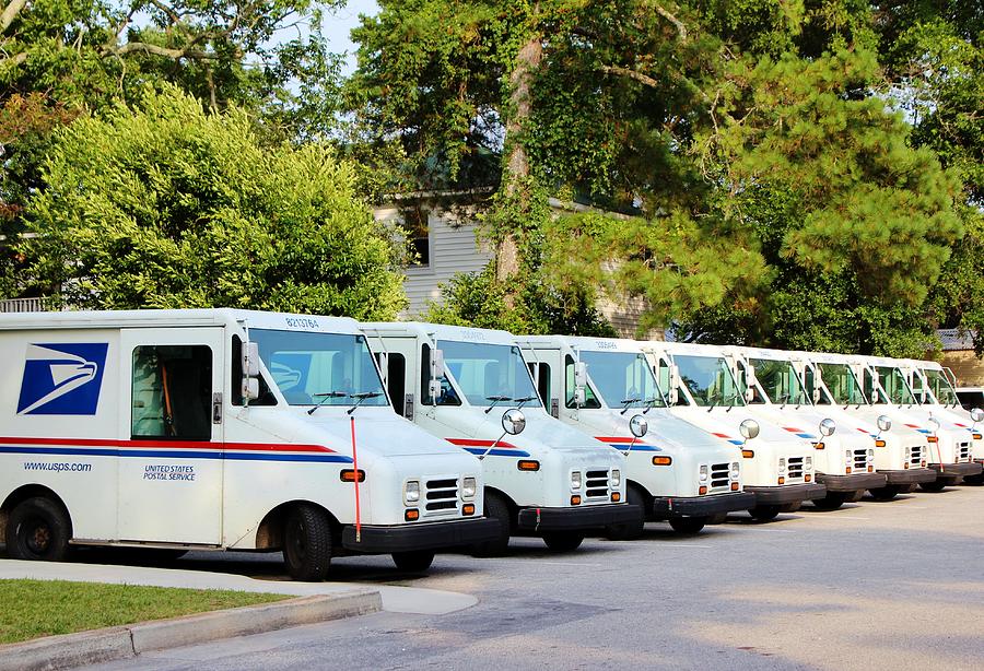 Mail Trucks Photograph by Cynthia Guinn