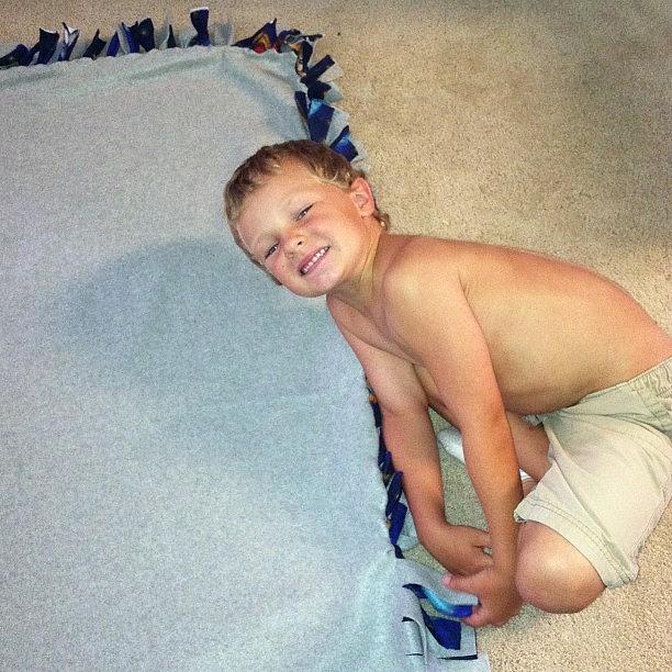 Making His Own Tie Blanket Photograph by Lauren Andrews Making His Own Tie Blanket Photograph by Lauren Andrews
