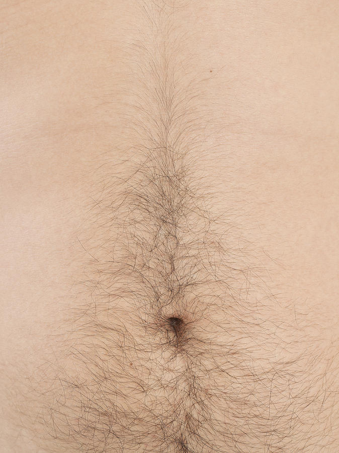 Male abdomen, close-up, mid section Photograph by Feliz Aggelos