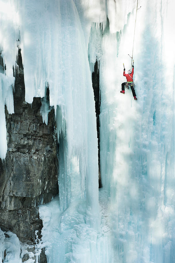 Male Ice Climber Scales Big Ice-covered Photograph by Kjell Linder Male Ice Climber Scales Big Ice-covered Photograph by Kjell Linder