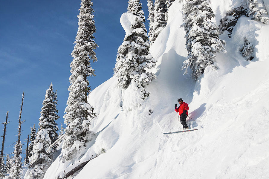 Male Skier Stops To Look Around While Photograph by Craig Moore Fine