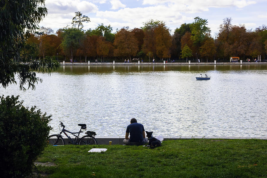 Man and Dog by the Manzanares River - Madrid - Spain Photograph by Madeline Ellis