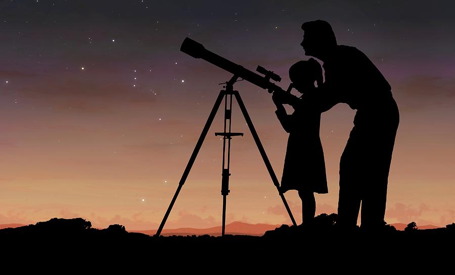 Man And Girl Using Telescope Photograph by Mark Garlick/science Photo Library