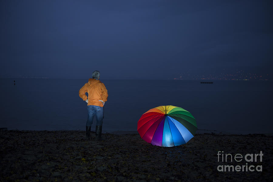 Man and umbrella Photograph by Mats Silvan
