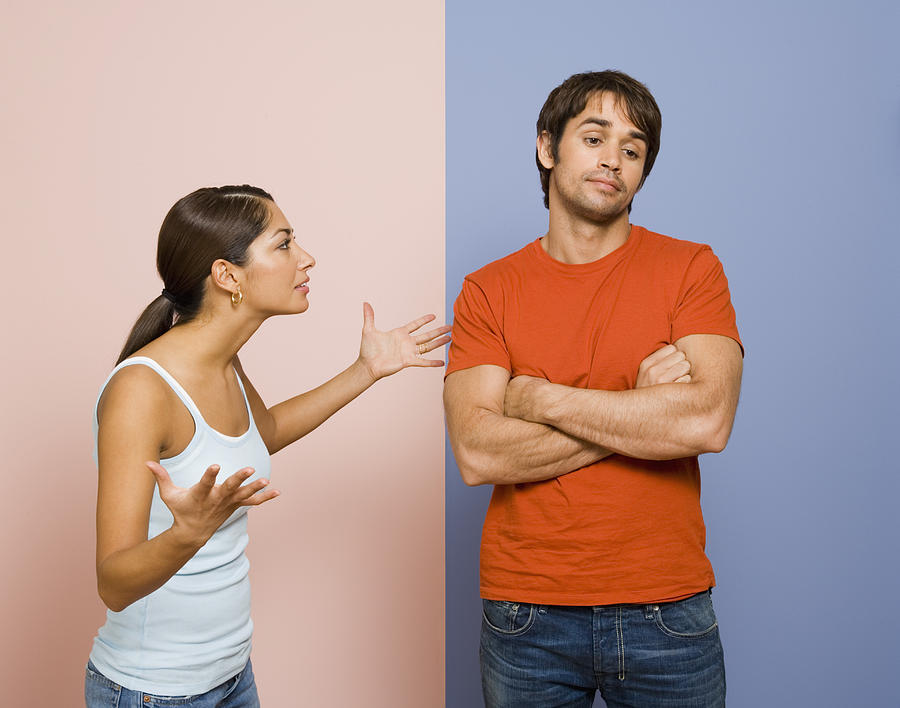 Man and woman arguing Photograph by Jupiterimages