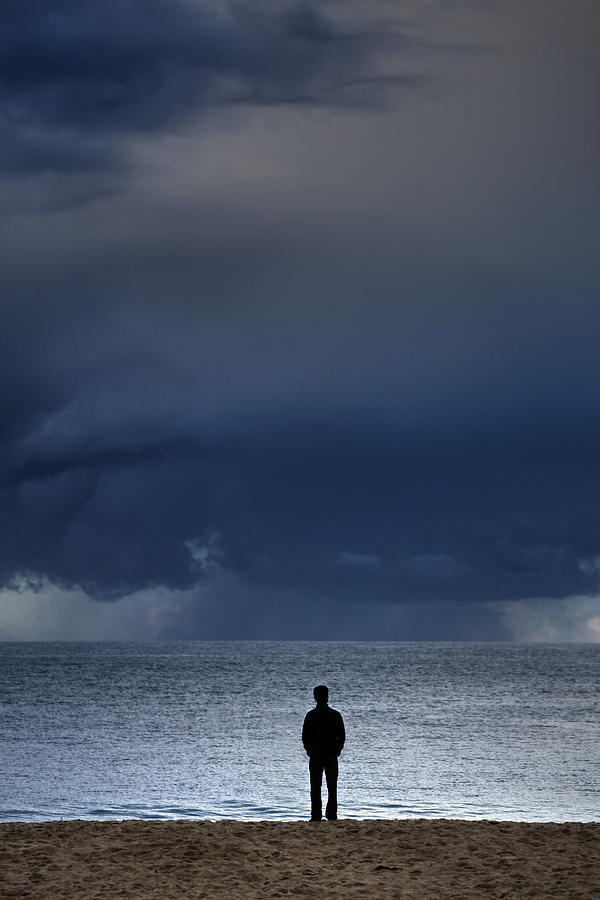 Man Before the Storm Photograph by Cliff Wassmann