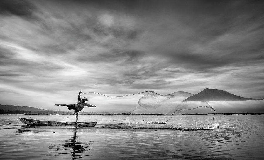 Black And White Photograph - Man Behind The Nets by Arief Siswandhono