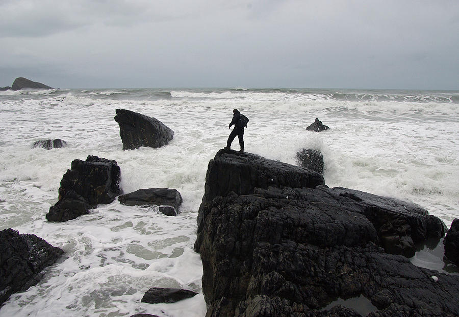 Man braving Waves Photograph by Pete Hemington