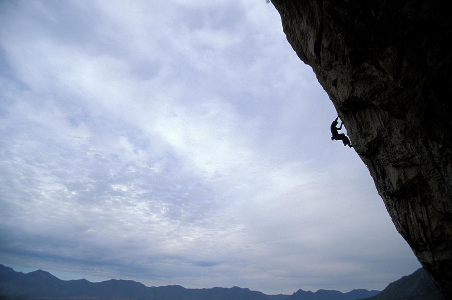 Mountain Photograph - Man Climbing A Big Wall In El Potrero by Corey Rich