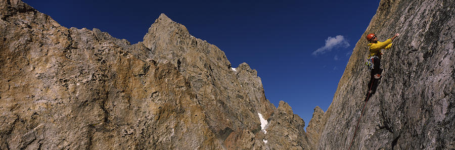 Grand Teton National Park Photograph - Man Climbing Up A Mountain, Grand by Panoramic Images