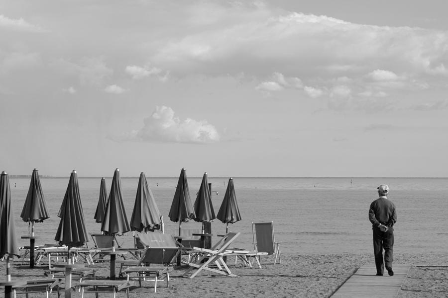 Black And White Photograph - Man contemplating the sea - monochrome by Ulrich Kunst And Bettina Scheidulin