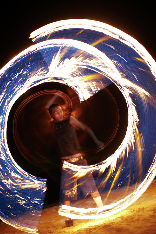 Man Dancing With Fire On Beach Photograph by Johner Images