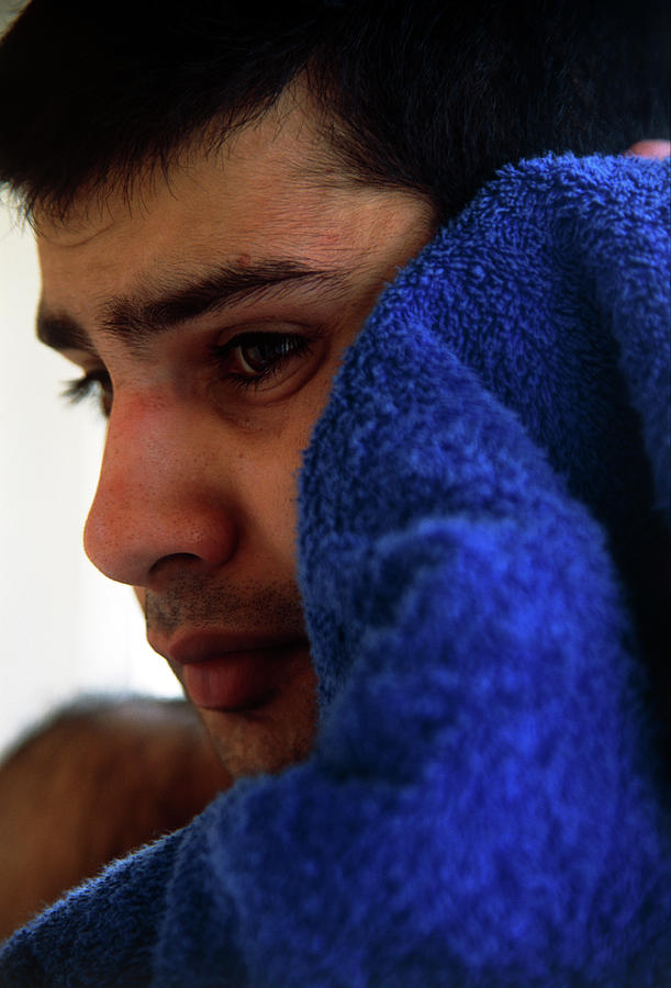 Man Drying Face With Towel Photograph by Tracy Rutter/science Photo Library