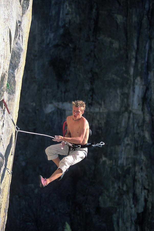 Yosemite National Park Photograph - Man Falls While Rock Climbing by Corey Rich