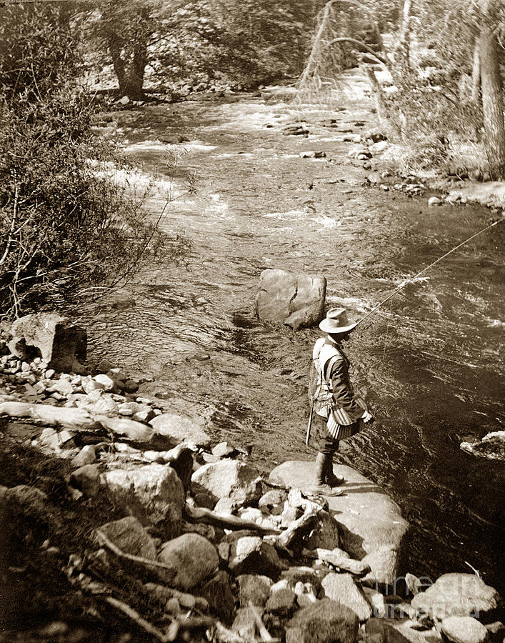 Trout Photograph - Man fly fishing in a river California Circa 1910 by Monterey County Historical Society