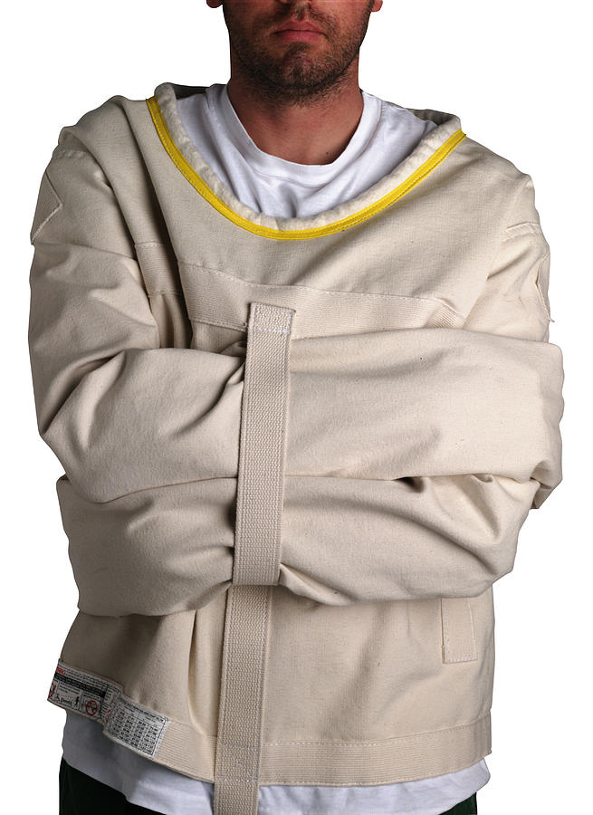 Man in a straight jacket Photograph by Brand X Pictures