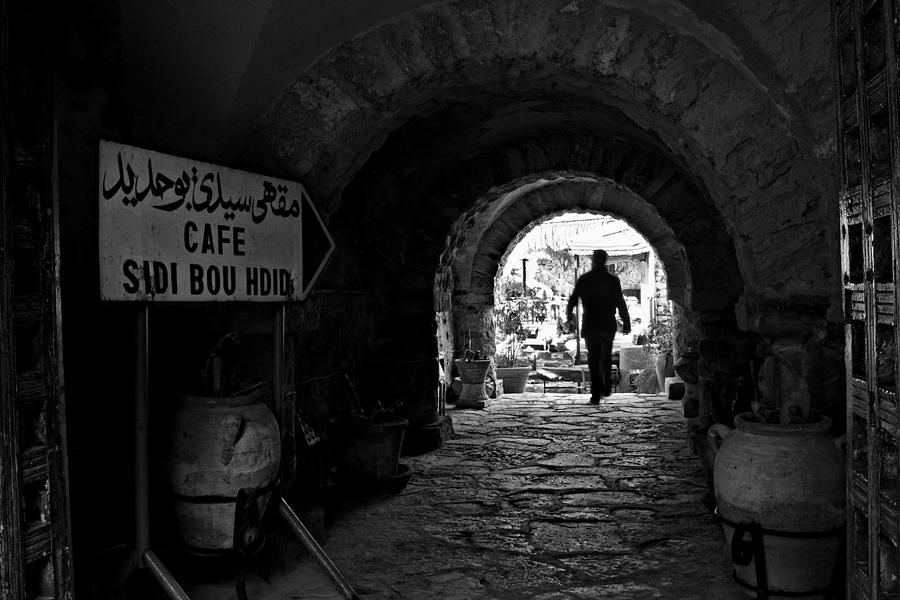 Architecture Photograph - Man in an Archway - Tunisia by Barry O Carroll