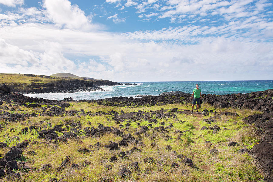 Man In Easter Island Landscape Next To Photograph by Volanthevist