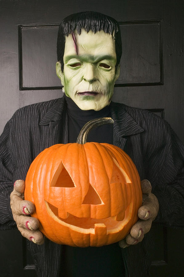 Man In Frankenstein Costume Holding Jack Olantern Photograph by Garry Gay Man In Frankenstein Costume Holding Jack Olantern Photograph by Garry Gay