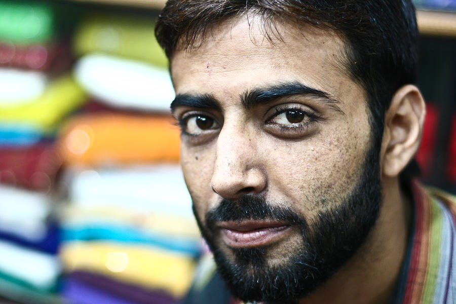 Man in shop New Dehli. India Photograph by Jean Schweitzer - Fine Art ...