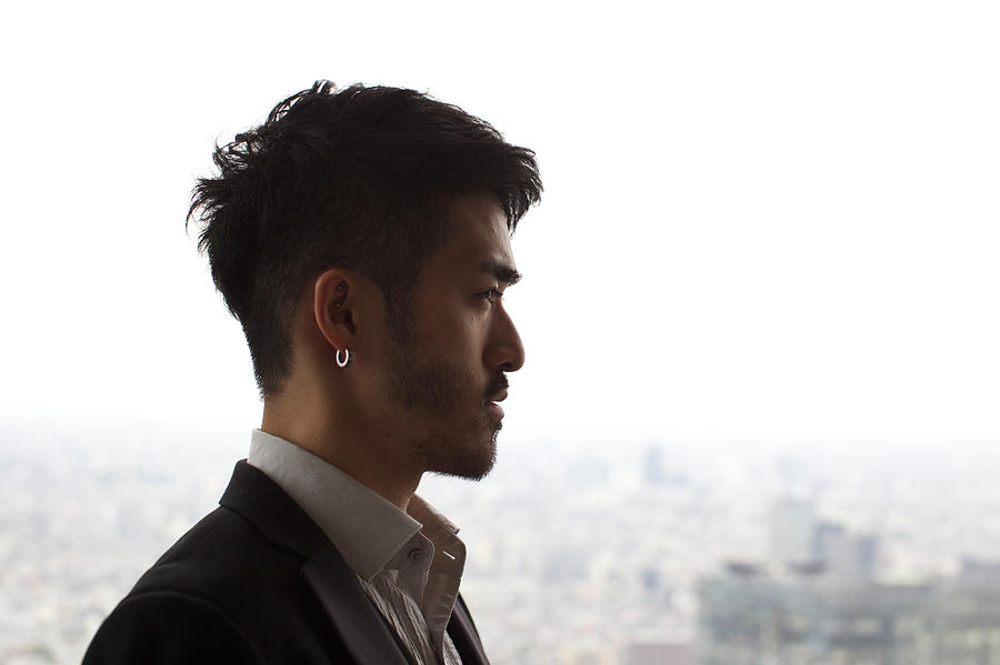 Man looking city view Photograph by Tadamasa Taniguchi